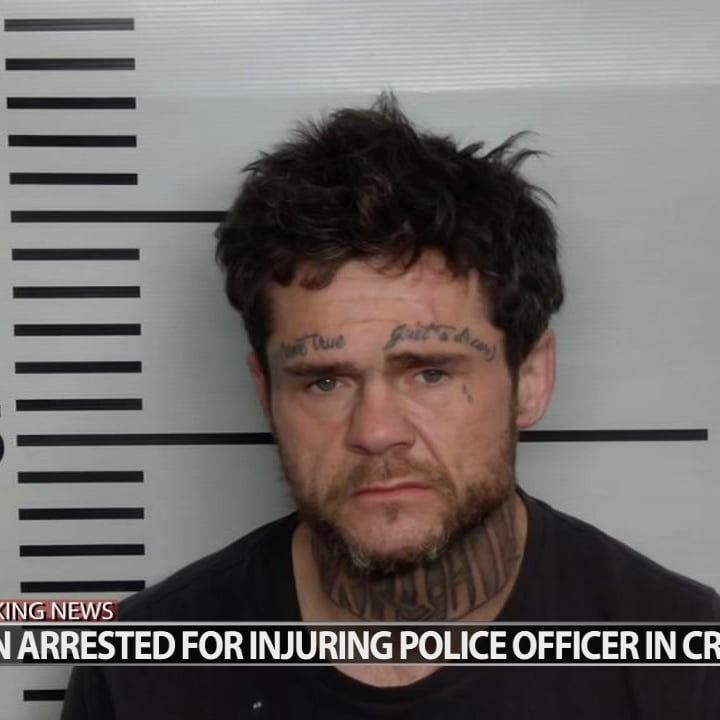 Man arrested for injuring LMPD officer in stolen car crash